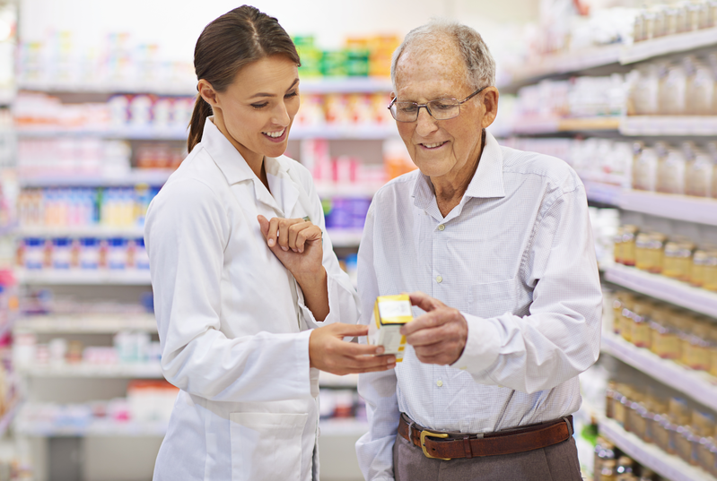 pharmacist with patient