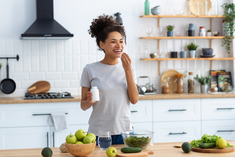 woman taking weight loss supplement